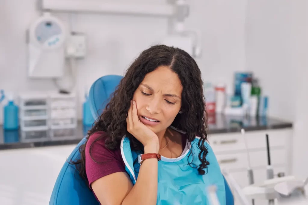 A patient being seen for a dental emergency at McQuary Dental in Tallahassee